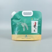 2kg黃小米袋+UV塑料復(fù)合+自立帶吸嘴